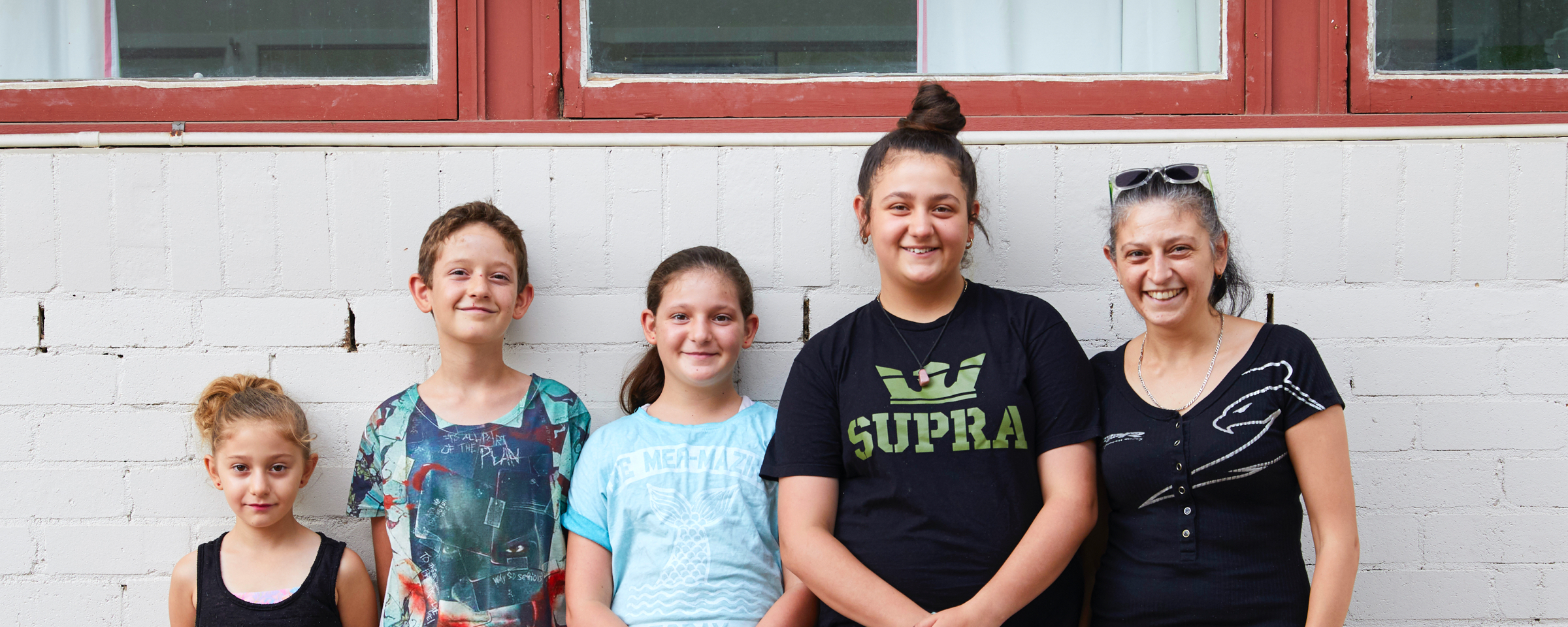 Photo of group of kids with Family by Family kids coach
